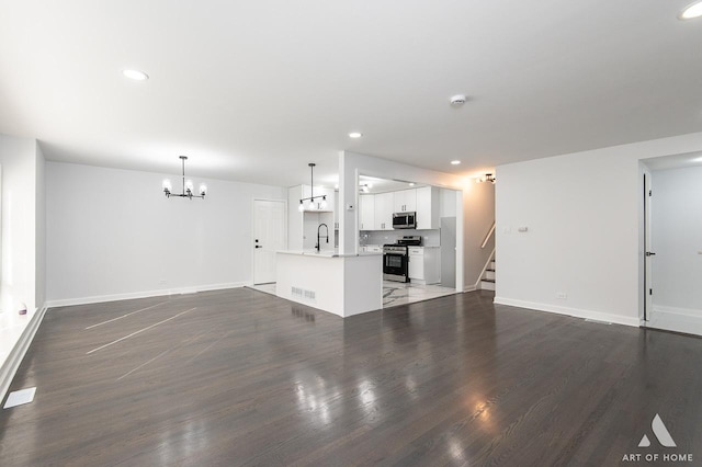 251 N Pleasant Dr, Glenwood, IL 60425 - kitchen with white cabinetry, light stone countertops, a sink, and dishwasher