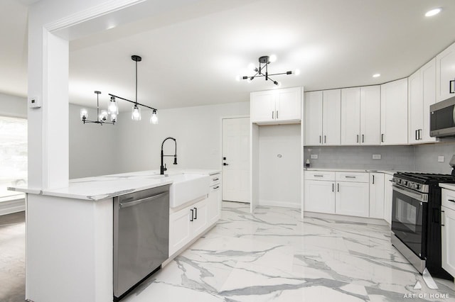 251 N Pleasant Dr, Glenwood, IL 60425 - kitchen featuring appliances with stainless steel finishes, a sink, light stone counters, a notable chandelier, and recessed lighting