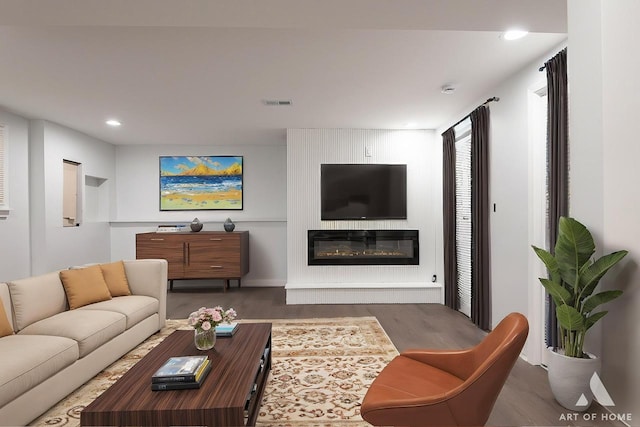 251 N Pleasant Dr, Glenwood, IL 60425 - living room featuring visible vents, recessed lighting, wood finished floors, and a fireplace