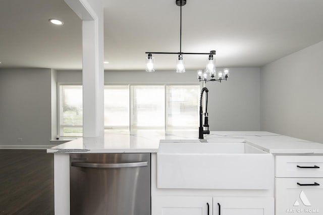 251 N Pleasant Dr, Glenwood, IL 60425 - kitchen with white cabinetry, light stone countertops, a sink, and dishwasher