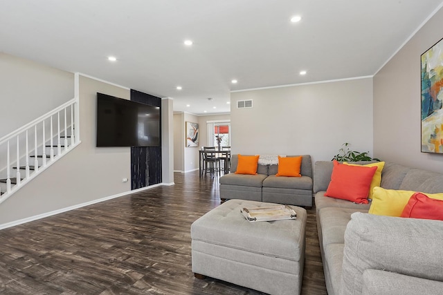 living area with ornamental molding, wood finished floors, stairway, recessed lighting, and baseboards