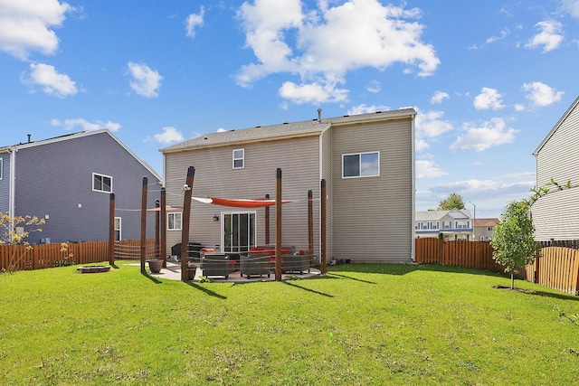 rear view of house featuring a patio