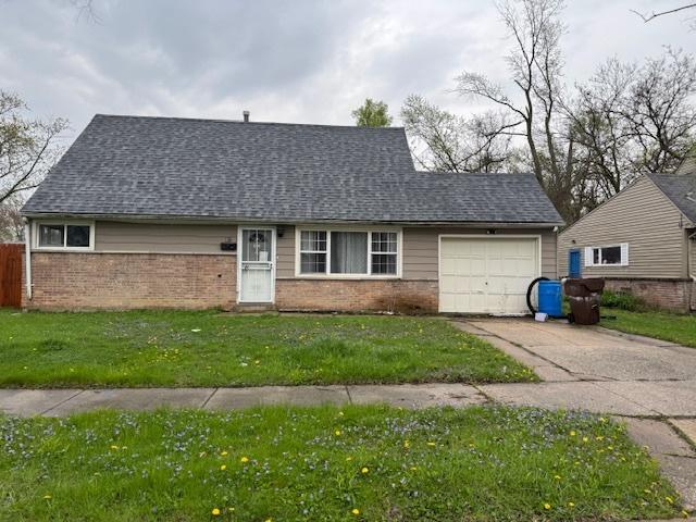 view of front of house featuring concrete driveway, brick siding, a shingled roof, and a garage