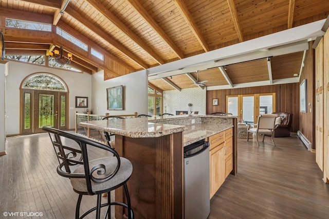 184A River Rd, Lake Barrington, IL 60010 - kitchen with open floor plan, baseboard heating, dark wood-style flooring, an island with sink, and plenty of natural light
