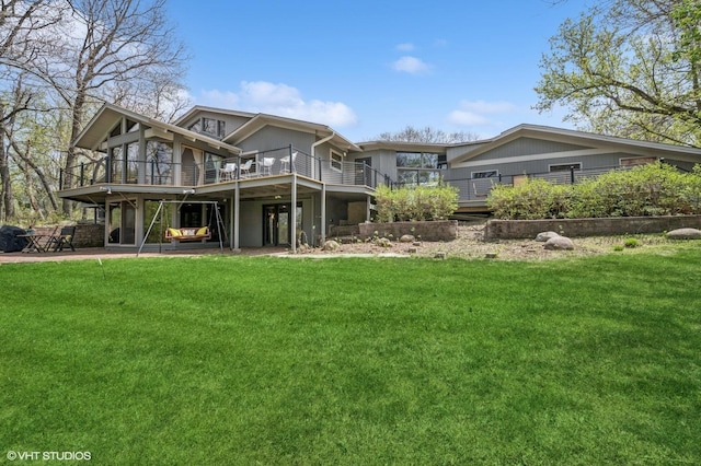 184A River Rd, Lake Barrington, IL 60010 - rear view of house with a lawn, a wooden deck, and a patio