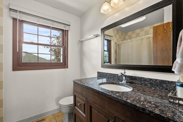 bathroom featuring tile patterned flooring, vanity, toilet, a shower with shower curtain, and baseboards