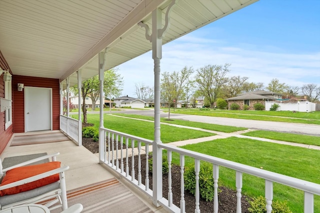view of patio / terrace featuring a residential view and covered porch