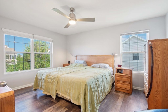 1046 Piccolo Ln, Volo, IL 60073 - bedroom with baseboards, dark wood-style flooring, and a ceiling fan
