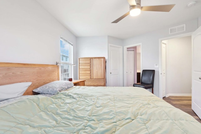 1046 Piccolo Ln, Volo, IL 60073 - bedroom with wood finished floors, baseboards, and a ceiling fan