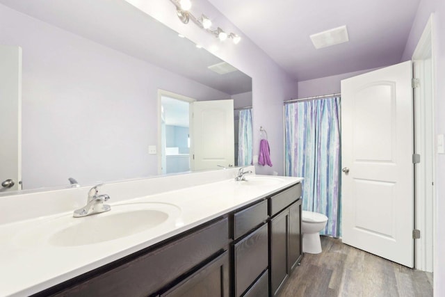 1046 Piccolo Ln, Volo, IL 60073 - full bath with wood finished floors, toilet, and double vanity