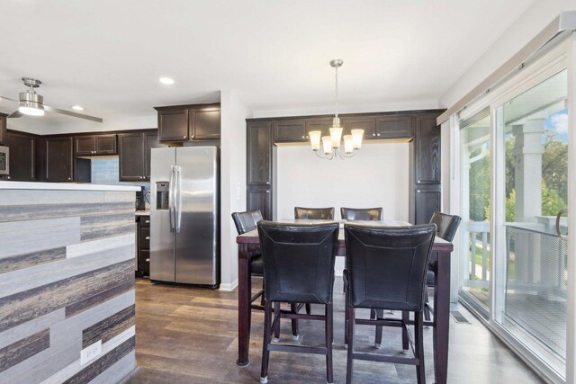 1046 Piccolo Ln, Volo, IL 60073 - dining space featuring a chandelier, dark wood finished floors, and recessed lighting