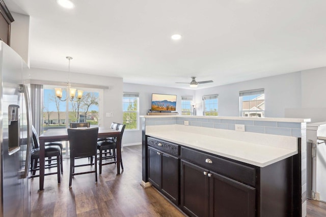 1046 Piccolo Ln, Volo, IL 60073 - kitchen featuring a chandelier, plenty of natural light, dark wood-style floors, light countertops, and recessed lighting