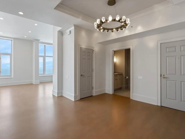 132 E Delaware Pl Unit 6205-07, Chicago, IL 60611 - interior space featuring recessed lighting, baseboards, a notable chandelier, and concrete flooring