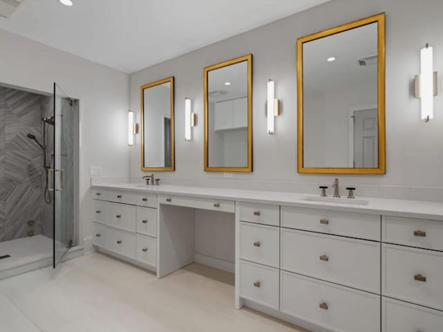 132 E Delaware Pl Unit 6205-07, Chicago, IL 60611 - bathroom featuring visible vents, recessed lighting, vanity, and a shower stall