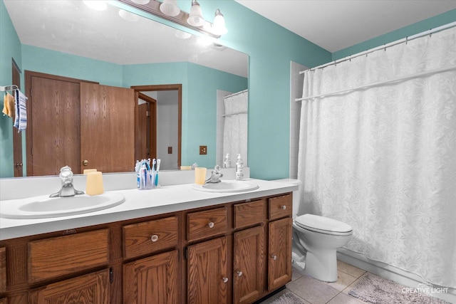 1081 Hunt Wyck Ct Unit 1081, Elgin, IL 60120 - full bathroom with double vanity, toilet, a sink, and tile patterned flooring