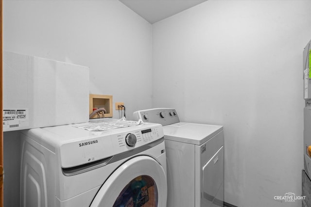 1081 Hunt Wyck Ct Unit 1081, Elgin, IL 60120 - laundry area featuring laundry area and washing machine and clothes dryer