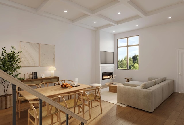 5365 N Bowmanville Ave, Chicago, IL 60625 - dining space with coffered ceiling, a glass covered fireplace, wood-type flooring, beam ceiling, and recessed lighting