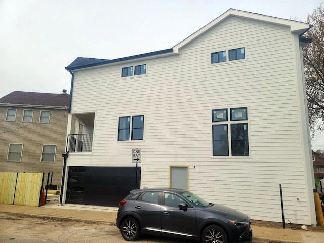 5365 N Bowmanville Ave, Chicago, IL 60625 - rear view of house with an attached garage