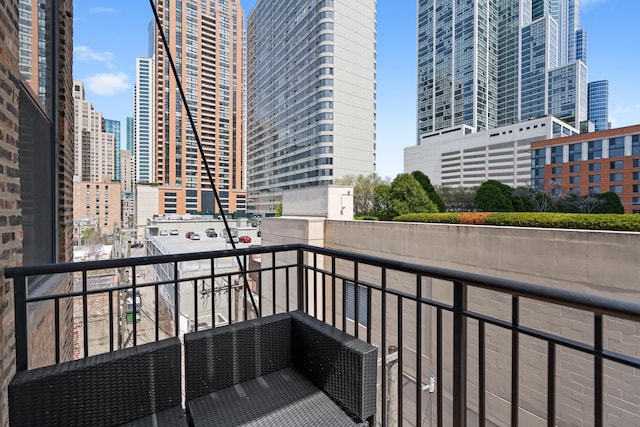 balcony featuring a view of city