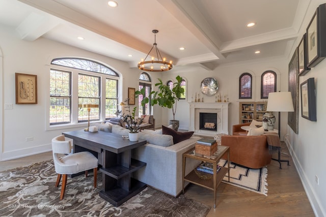 6907 S Constance Ave, Chicago, IL 60649 - living room featuring recessed lighting, beamed ceiling, baseboards, and a high end fireplace