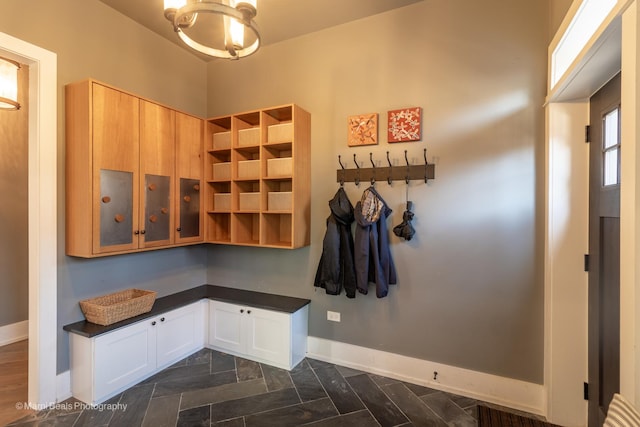 6907 S Constance Ave, Chicago, IL 60649 - mudroom featuring baseboards