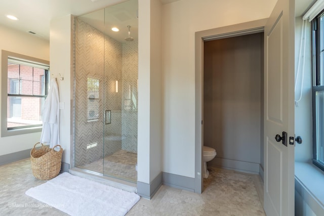 6907 S Constance Ave, Chicago, IL 60649 - bathroom with toilet, baseboards, recessed lighting, and a stall shower