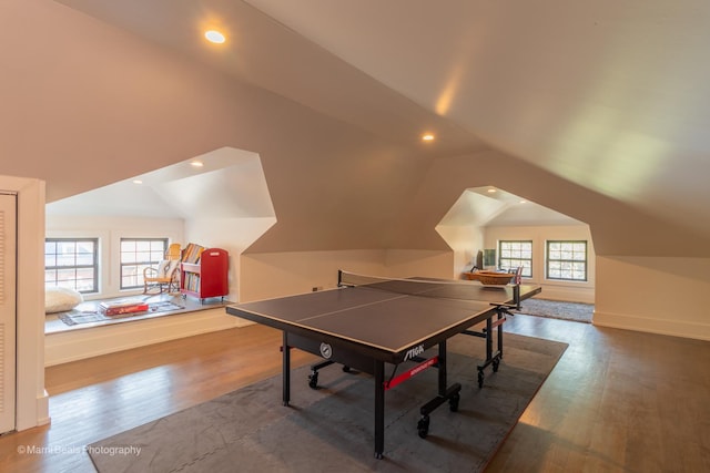 6907 S Constance Ave, Chicago, IL 60649 - rec room with recessed lighting, baseboards, vaulted ceiling, and wood finished floors