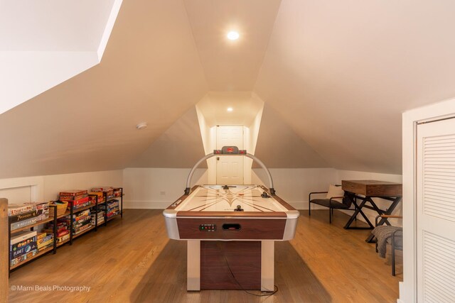 6907 S Constance Ave, Chicago, IL 60649 - playroom with baseboards, recessed lighting, wood finished floors, and lofted ceiling