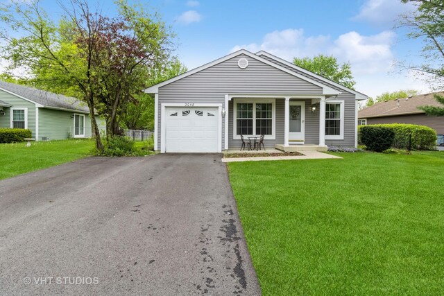 2048 Navarone Dr, Naperville, IL 60565 - single story home with covered porch, a garage, driveway, and a front yard