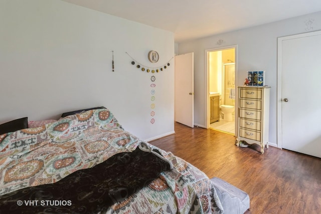 2048 Navarone Dr, Naperville, IL 60565 - bedroom featuring baseboards, connected bathroom, and wood finished floors