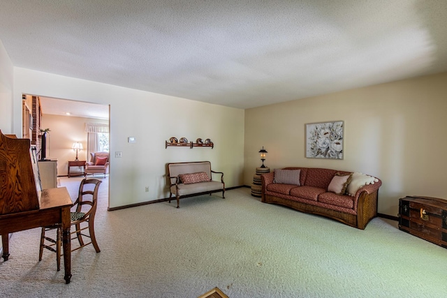 11 N Beech St, Princeton, IL 61356 - living room featuring carpet flooring, baseboards, and a textured ceiling