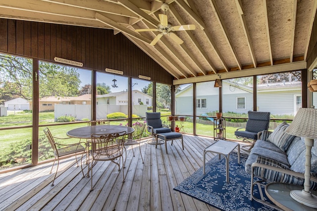 11 N Beech St, Princeton, IL 61356 - sunroom / solarium featuring ceiling fan, vaulted ceiling, an outdoor living space, outdoor dining space, and healthy amount of natural light