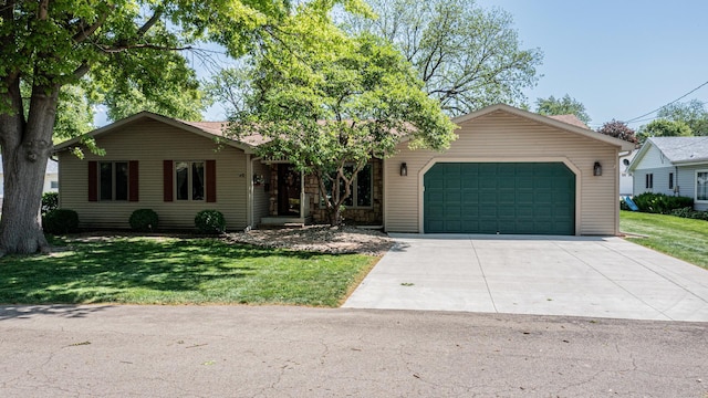 11 N Beech St, Princeton, IL 61356 - single story home featuring an attached garage, concrete driveway, and a front lawn