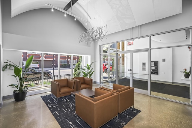 community lobby with a high ceiling