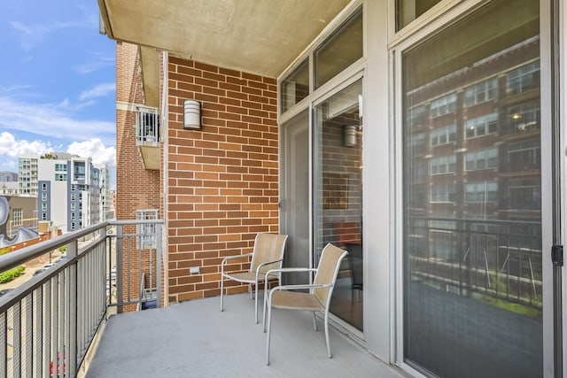 balcony featuring a city view