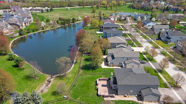 aerial view featuring a water view and a residential view