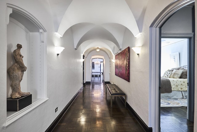 222 E Chestnut St Unit 7B, Chicago, IL 60611 - corridor featuring arched walkways and baseboards