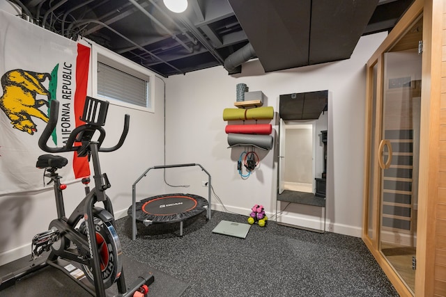 exercise area with baseboards