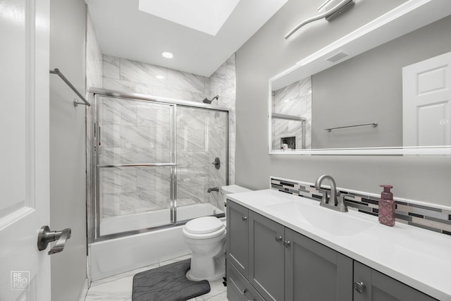 401 Jason Ln, Schaumburg, IL 60173 - bathroom featuring vanity, visible vents, marble finish floor, tasteful backsplash, and combined bath / shower with glass door