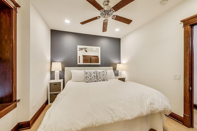 bedroom featuring recessed lighting, baseboards, and light wood-style floors
