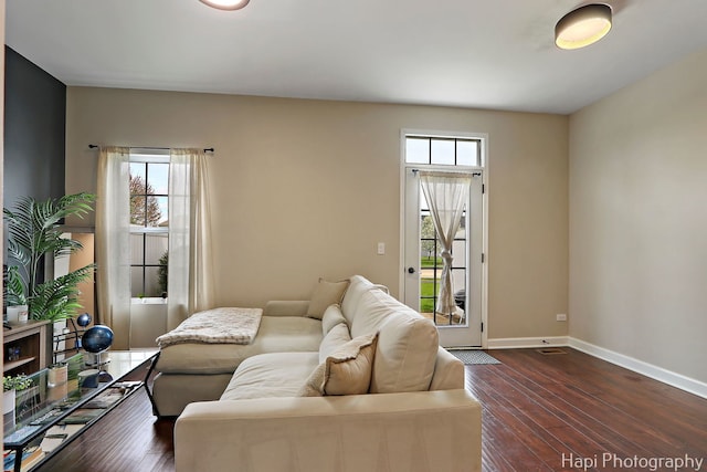 2815 Kendall Xing, Johnsburg, IL 60051 - living area featuring baseboards and dark wood-type flooring