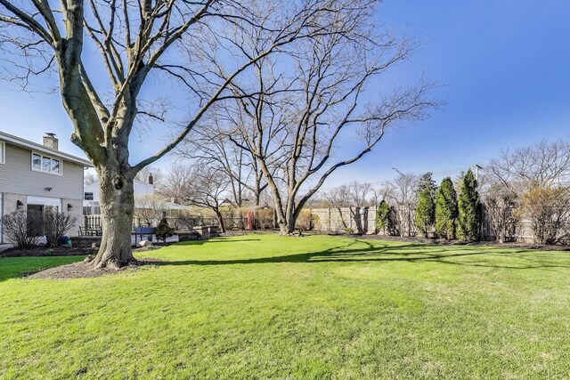 view of yard with fence