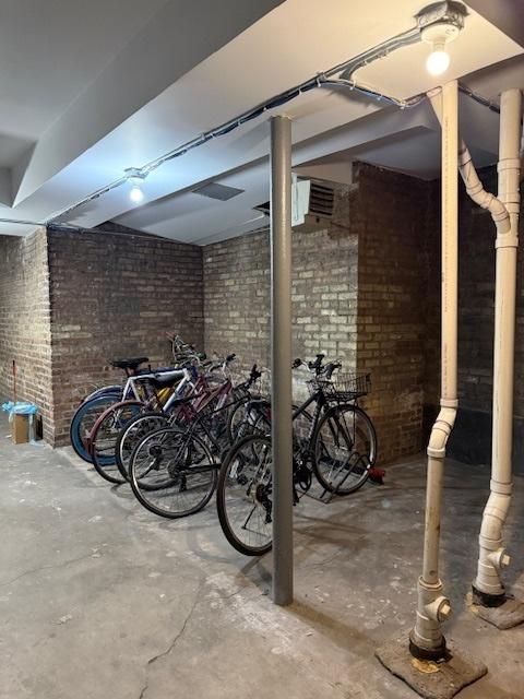 534 W Belmont Ave Unit 2S, Chicago, IL 60657 - finished basement with brick wall