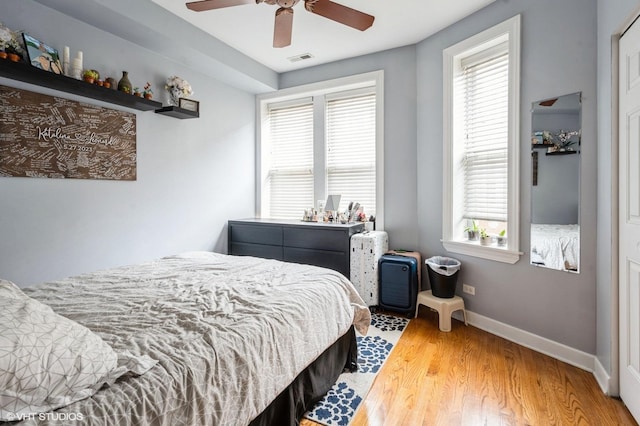 534 W Belmont Ave Unit 2S, Chicago, IL 60657 - bedroom featuring light wood-type flooring, visible vents, and multiple windows