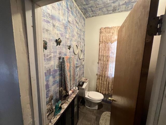 bathroom featuring toilet