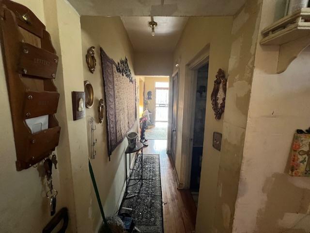 hallway featuring wood finished floors