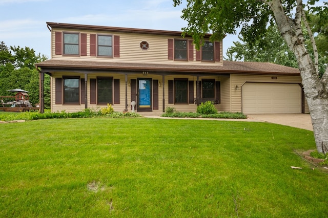 848 Stewart St, Batavia, IL 60510 - view of front of house featuring a garage, a porch, a front yard, and driveway