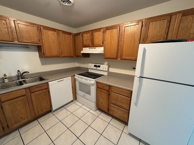 420 Walnut Creek Ln Unit 3103, Lisle, IL 60532 - kitchen featuring white appliances, a sink, under cabinet range hood, brown cabinetry, and light tile patterned floors