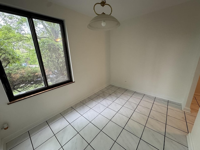 420 Walnut Creek Ln Unit 3103, Lisle, IL 60532 - unfurnished dining area with light tile patterned flooring and baseboards