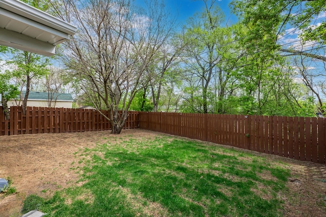 view of yard featuring a fenced backyard